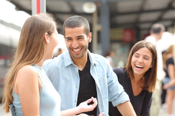 https://st2.depositphotos.com/1809585/8903/i/450/depositphotos_89039882-Three-friends-talking-and-laughing-in-a-train-station.jpg