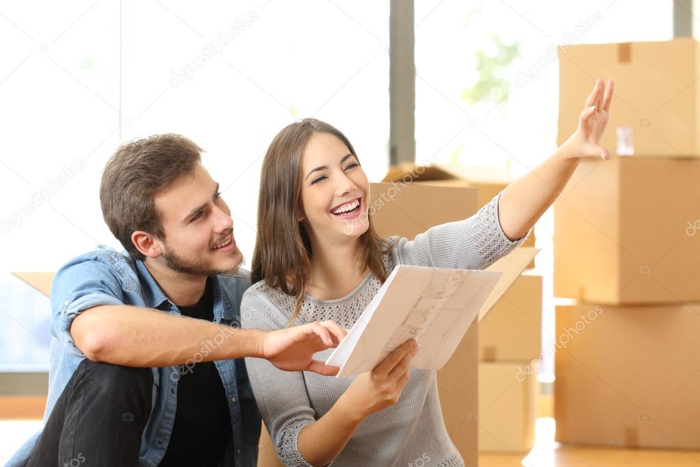 Couple planning decoration when moving home