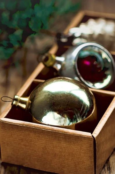 Vintage Christmas Decorations in the box on a wooden table — Stock Photo, Image