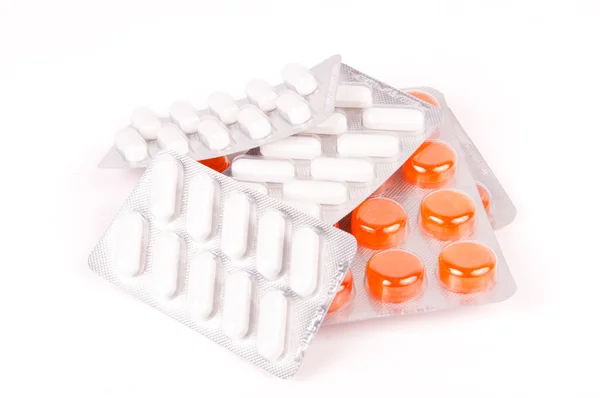 Confezioni di pillole bianche e arancioni — Foto Stock