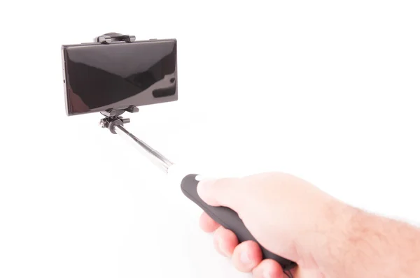 Ruka držící hůl selfie — Stock fotografie