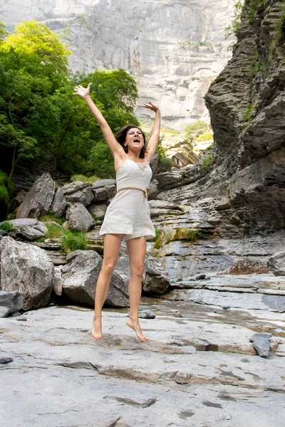 Joyful Woman Screaming Jumping Mountain Shorts White Top — Stock Photo, Image
