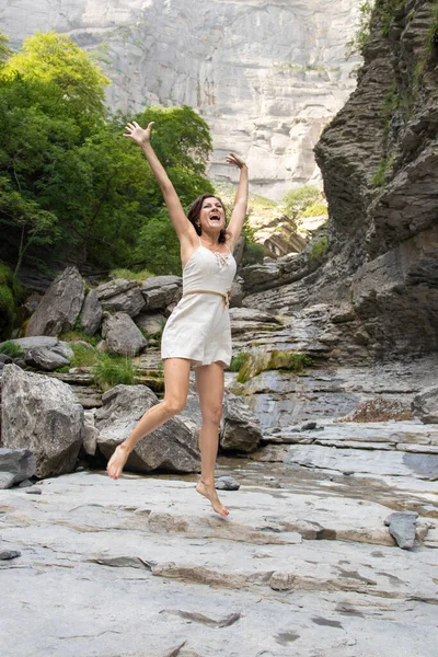 Joyful Woman Screaming Jumping Mountain Shorts White Top — Stock Photo, Image