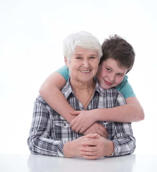 Menino e mulher idosa — Fotografia de Stock