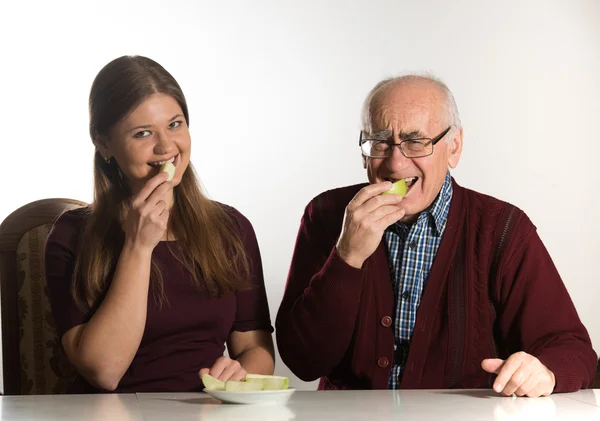 Young woman and senior man — Stock Photo, Image