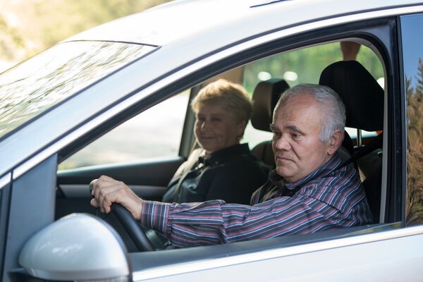 older driver using smartphone