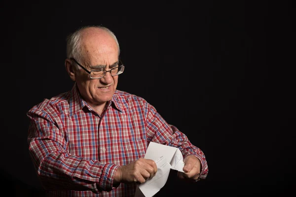 Old man with bank document — Stock Photo, Image