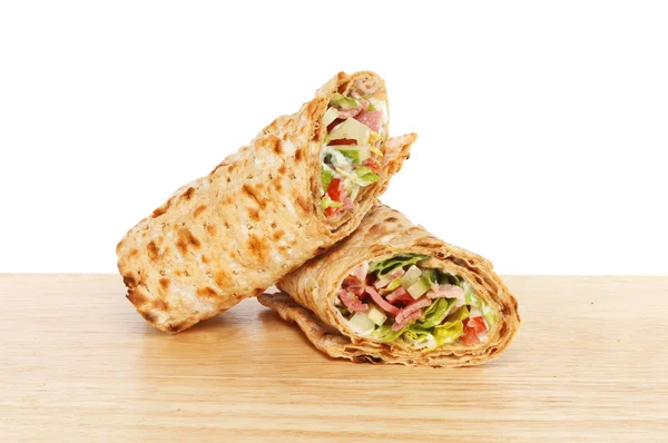 Sandwich wraps on a board — Stock Photo, Image