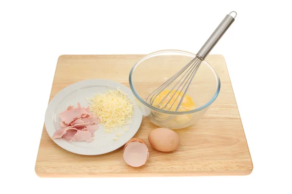 Omelette ingredients on a wooden board — Stock Photo, Image