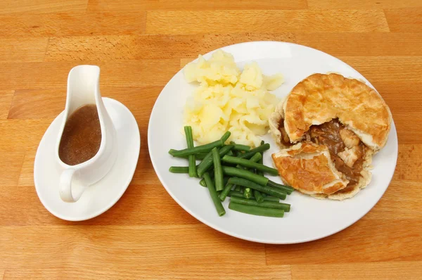 Chicken pie and potatoes — Stock Photo, Image