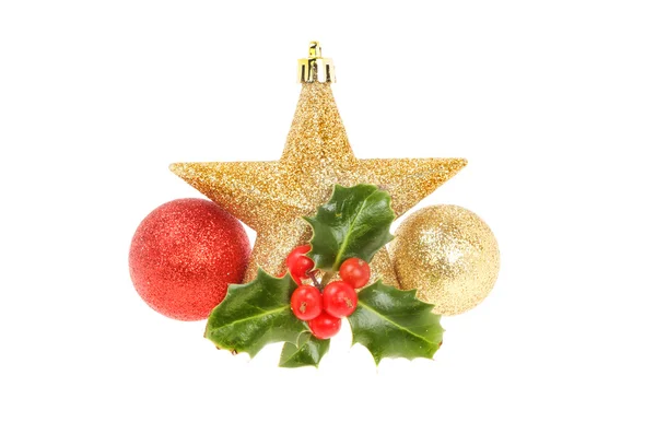 Christmas decoration stars balls and holly — Stock Photo, Image