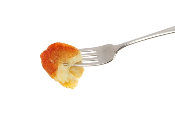 Roast potato on fork — Stock Photo, Image