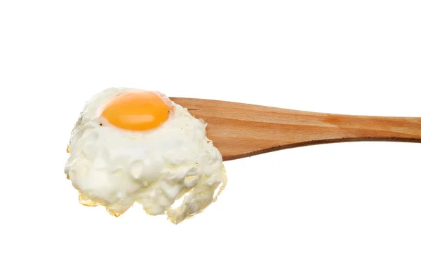 Fried egg on a spatula — Stock Photo, Image