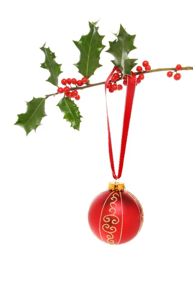 Bauble in holly — Stock Photo, Image