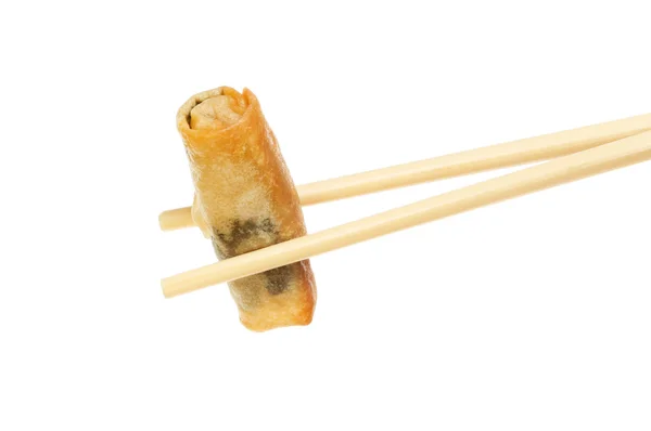 Spring roll in chopsticks — Stock Photo, Image