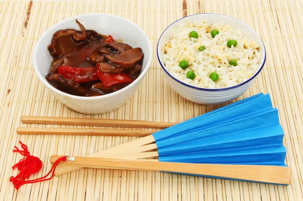 Oriental meal on a bamboo matt — Stock Photo, Image