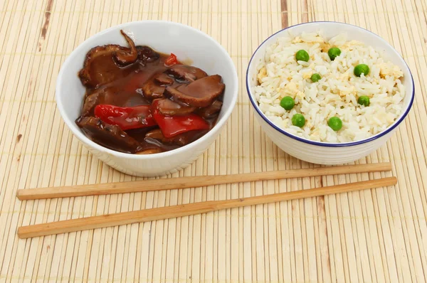 Oriental meal on bamboo matt — Zdjęcie stockowe