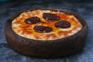 Traditional Turkish or middle eastern appetizer meze humus or hummus plate on the table in the restaurant