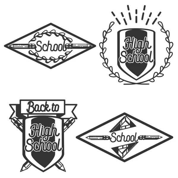 Vintage de volta aos emblemas da escola — Vetor de Stock