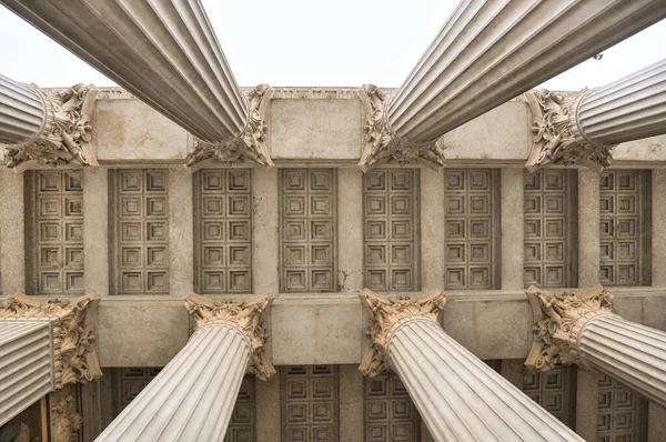 Ancient style of architecture. Ceiling and pillars. Minimal creative co position.