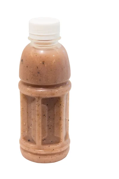 Suco de arroz marrom em garrafa de plástico isolado no fundo branco — Fotografia de Stock