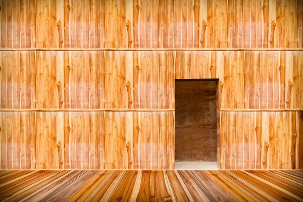 Parete in legno con porta e pavimento in legno davanti — Foto Stock