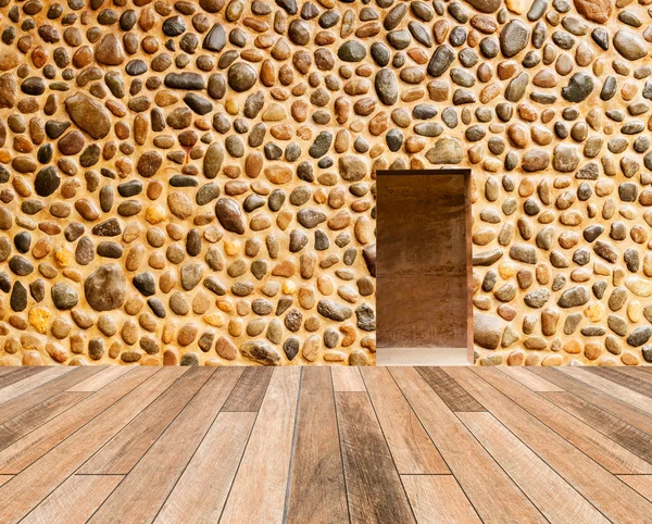 Mur de pierre avec porte et plancher de bois devant — Photo