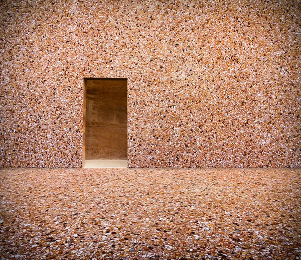 Stone wall with door and stone floor in front off — Stock Photo, Image