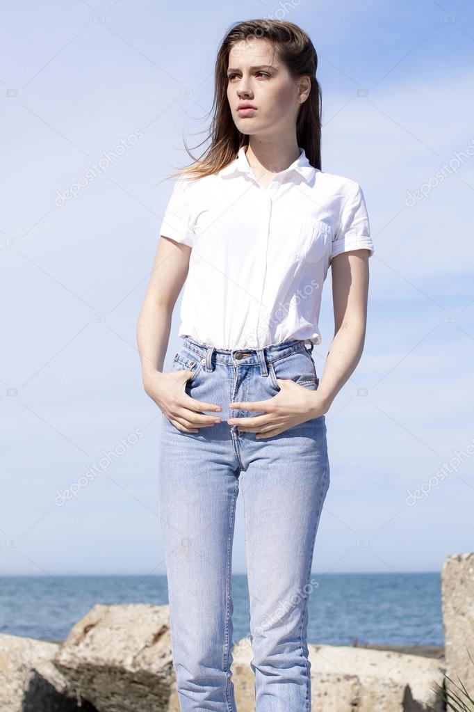Young beautiful girl dressed in plain clothes — Stock Photo © vadim28