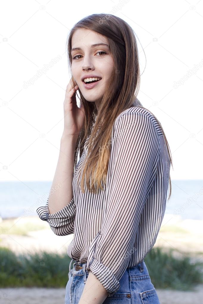 Young beautiful girl dressed in plain clothes
