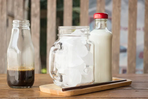 Homemade iced coffee ingredient on wooden table — Stock Photo, Image