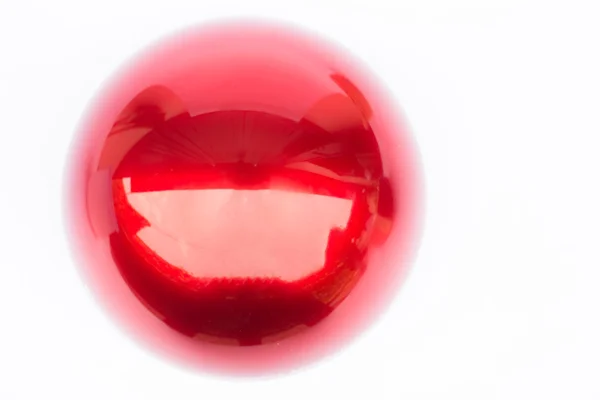 Shiny hard red ball on white background — Stock Photo, Image