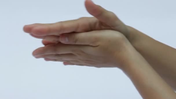 Woman hands applying hand cream — Stock Video