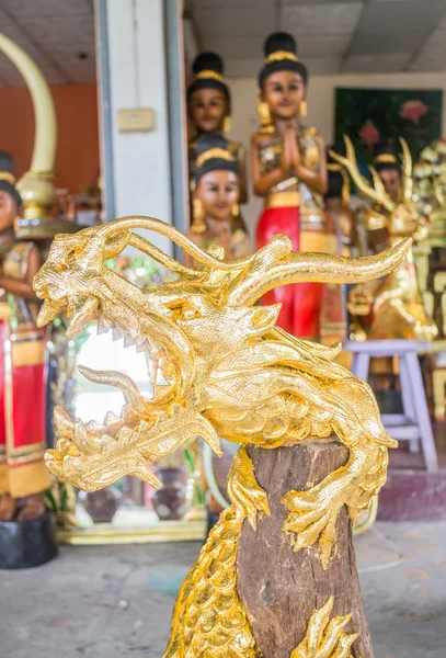 Handicraft golden dragon made of wood — Stock Photo, Image