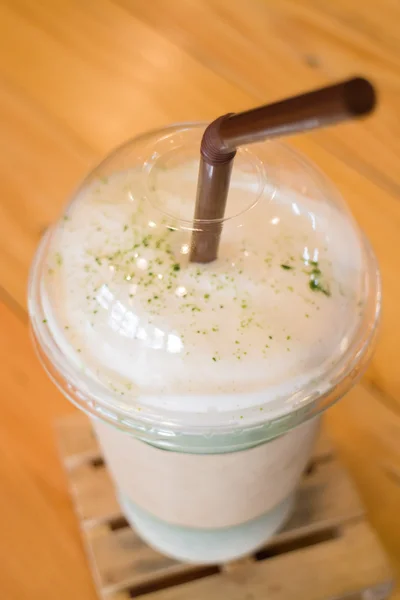 Glass of iced milk green tea — Stock Photo, Image