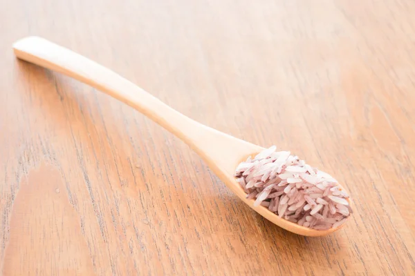 Spoon of organic berry jusmine rice — Stock Photo, Image