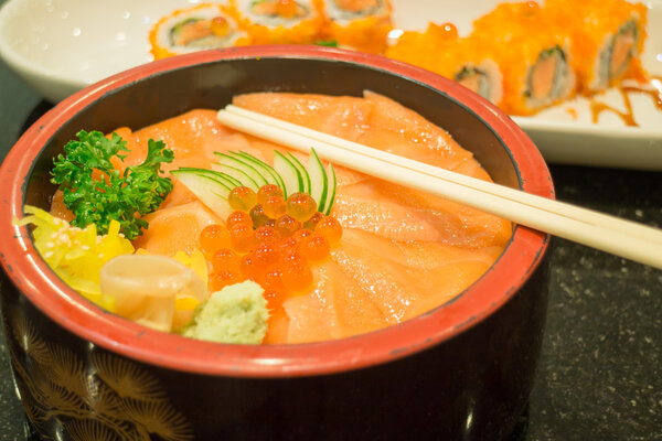 Japanese salmon sashimi and sushi roll