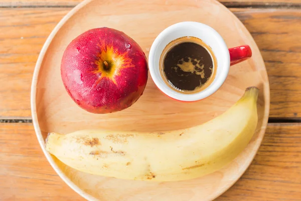 Fresh red apple, banana and coffee — Stock Photo, Image