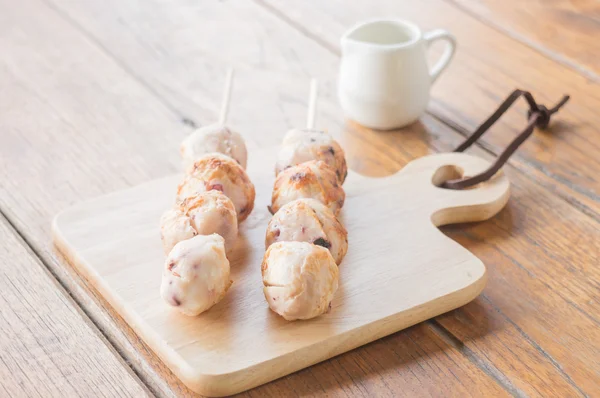 Squid grilled ball on wooden plate — Stock Photo, Image