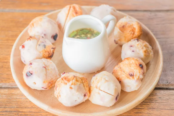 Squid grilled ball on wooden plate — Stock Photo, Image