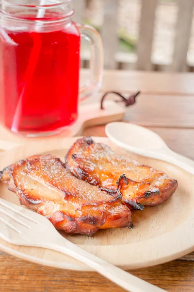 Chicken grilled steak on wooden plate — Stock Photo, Image