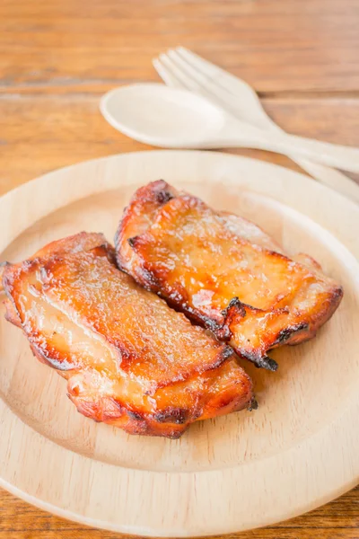 Chicken grilled steak on wooden plate — Stock Photo, Image