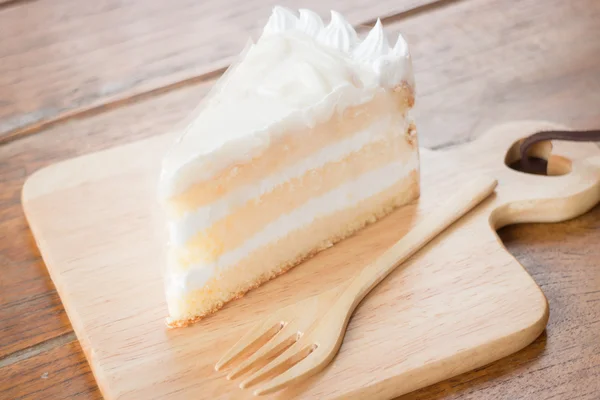 Coconut sponge cake with whipped cream — Stock Photo, Image