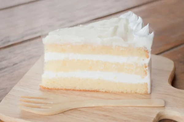 Coconut sponge cake with whipped cream — Stock Photo, Image