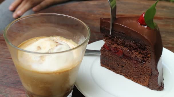 Having coffee break with affogato espresso and black forest cake — Stock Video