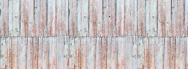 Piani di recinzione in legno squallido vernice a colori incrinata — Foto Stock