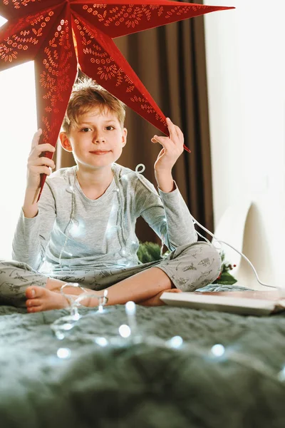 Boy Decorating Home Christmas Red Star Magic Christmas — Stock Photo, Image