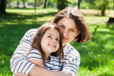 Happy Smiling Beautiful Mother and Daughter