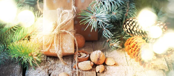 Christmas Background with Bright Light and Festive Natural Presents. Vintage Style — 스톡 사진