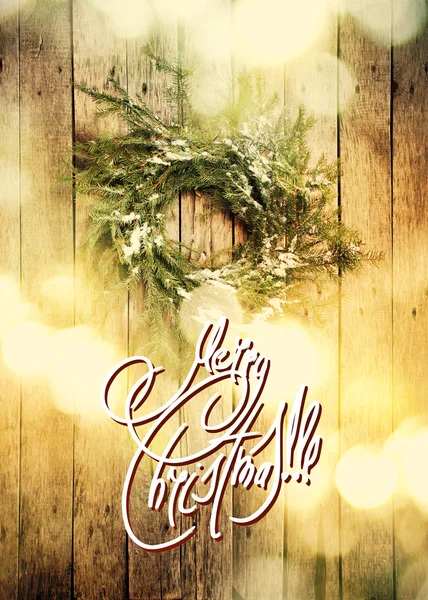 Greeting Card with Text Merry Christmas on Background from Green Natural Wreath. Light Boke. Toned — Stock Photo, Image